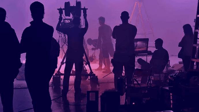 Film production set with crew members working